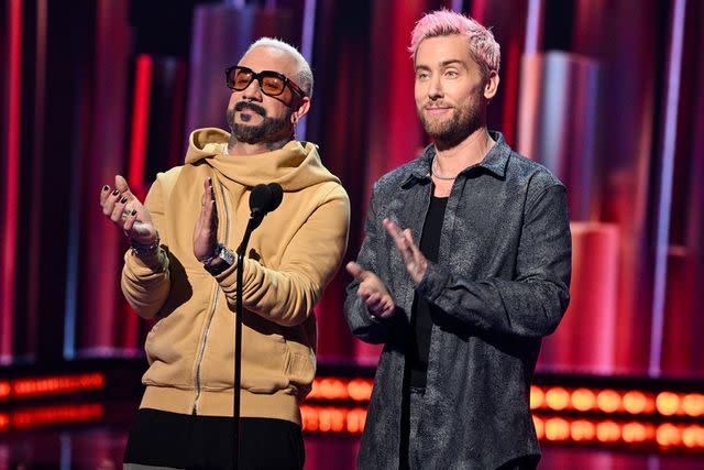 <p>Michael Buckner/Billboard via Getty Images</p> AJ McLean and Lance Bass on stage at the iHeartRadio Awards on April 1, 2024 in Los Angeles