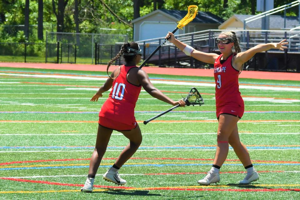 Lenape seniors Kareena Gohel and Gianna Monaco prepare to embrace after Gohel's goal against Morristown at the 2022 NJSIAA Group 4 girls lacrosse championship at Warren Hills High School