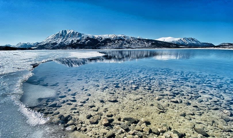 Scenery near Carcross. Darci Nyal, who moved to the Yukon in April, said she was struck by the sense of "spaciousness". "It's genuinely quiet at night and we like going out into the wilderness as far away from his people as possible."