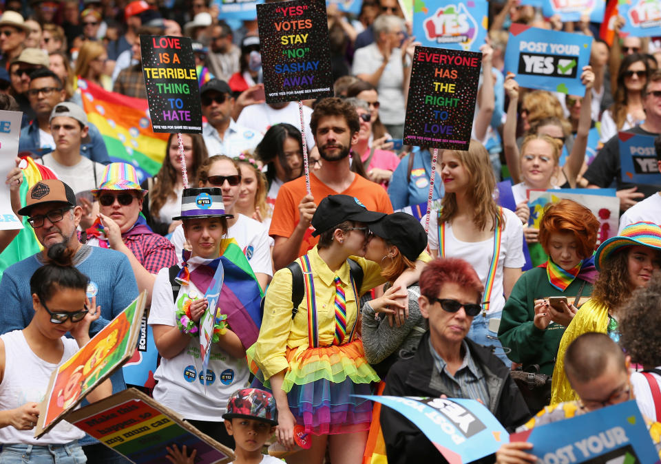 SYDNEY, AUSTRALIA - OCTOBER 21:  Two young girls share a kiss during a speech at the YES March for Marriage Equality on October 21, 2017 in Sydney, Australia. Australians are currently taking part in the Marriage Law Postal Survey, which is asking whether the law should be changed to allow same-sex marriage. Results will be announced on November 15.  (Photo by Don Arnold/Getty Images)