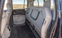 <p>And that seat easily folds tight against the back of the cab, leaving a massive space with a flat load floor, making it a cinch to transport a bunch of cargo in weather-tight security. Or you can put that stuff in the in-bed trunk, an idea that gets better the more you use it.</p>