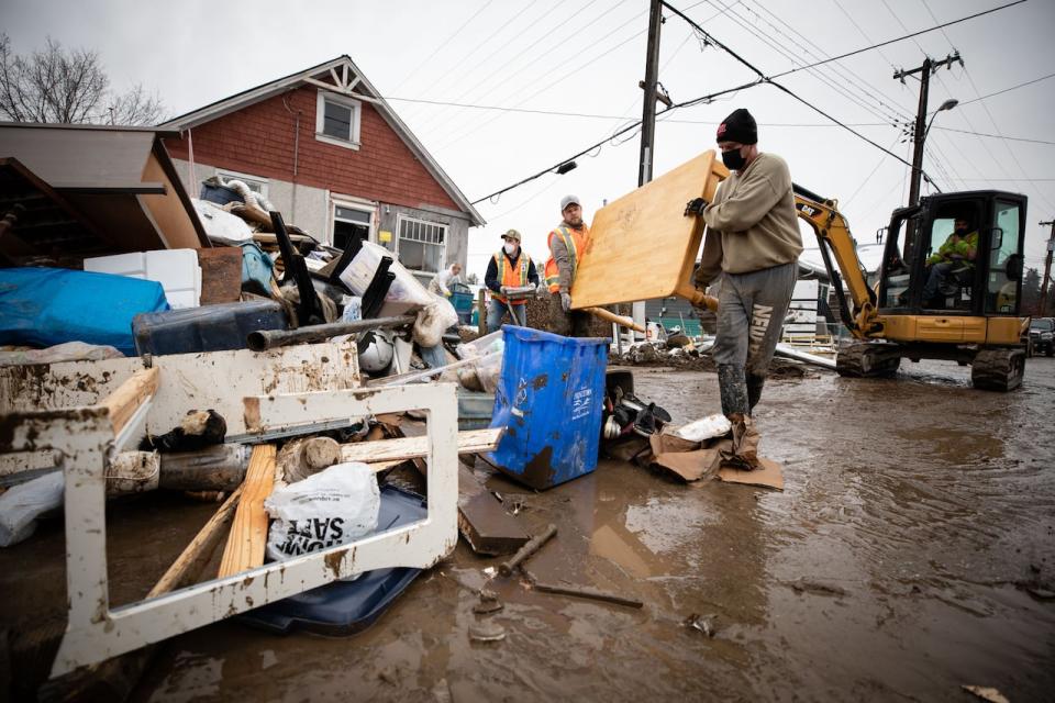 House is emptied out by volunteers after a major flood in Princeton, B.C. on Wednesday, November 24, 2021. 