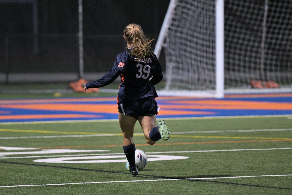Benjamin's Cameryn Grissman goes on a run downfield, scoring a goal on her birthday to cap off the scoring for the Buccaneers in their 6-0 semifinals win over Lincoln Park on Jan. 27, 2023.