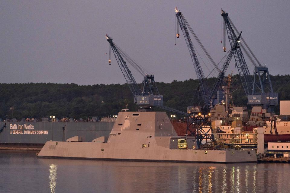 The USS Lyndon B. Johnson is docked at Bath Iron Works on the Kennebec River, Friday, Aug. 27, 2021, in Bath, Maine. The stealth destroyer is the last of three Zumwalt-class ships built by BIW. (AP Photo/Robert F. Bukaty)