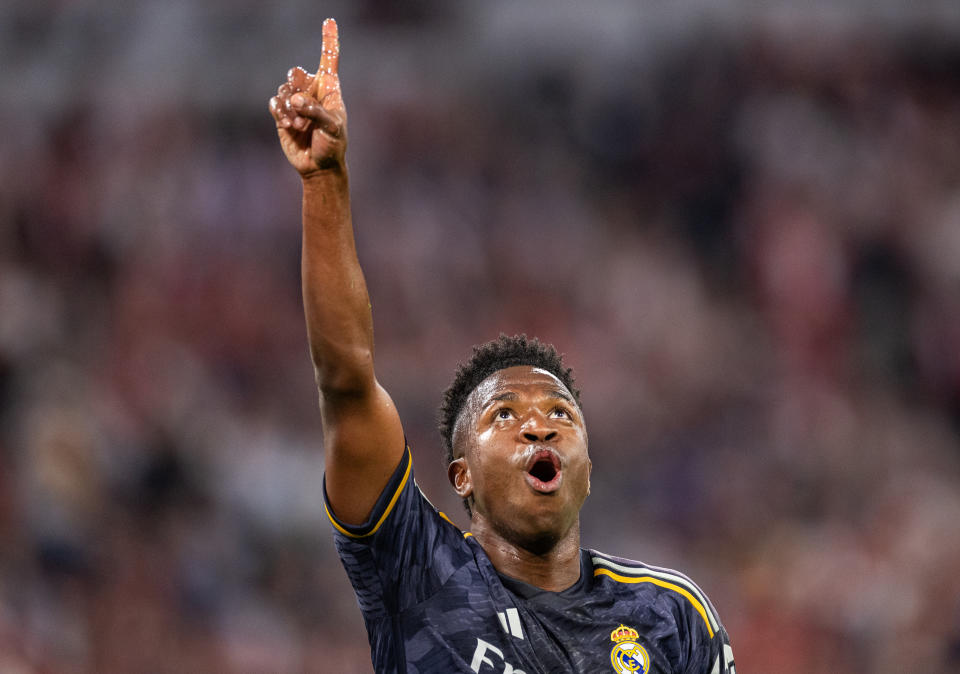 MUNICH, GERMANY - APRIL 30: Team's first goal during the UEFA Champions League semi-final first leg match between FC Bayern Munich and Real Madrid on April 30, 2024 at the Allianz Arena in Munich, Germany. Real Madrid's Vinicius Junior celebrates after scoring.  (Photo by Boris Strobel/Getty Images)