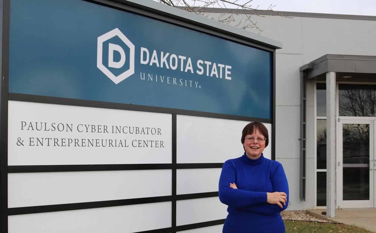 Katherine Cota stands outside Dakota State's Paulson Center in Madison, South Dakota.