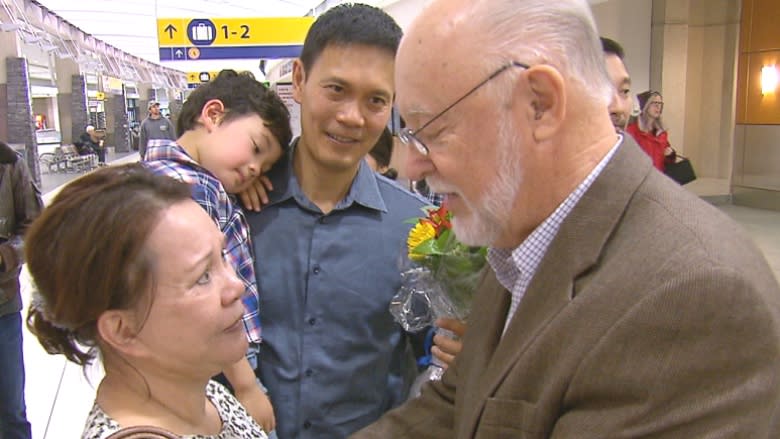 He smuggled 2 young boys out of Laos in 1977, now they've reunited