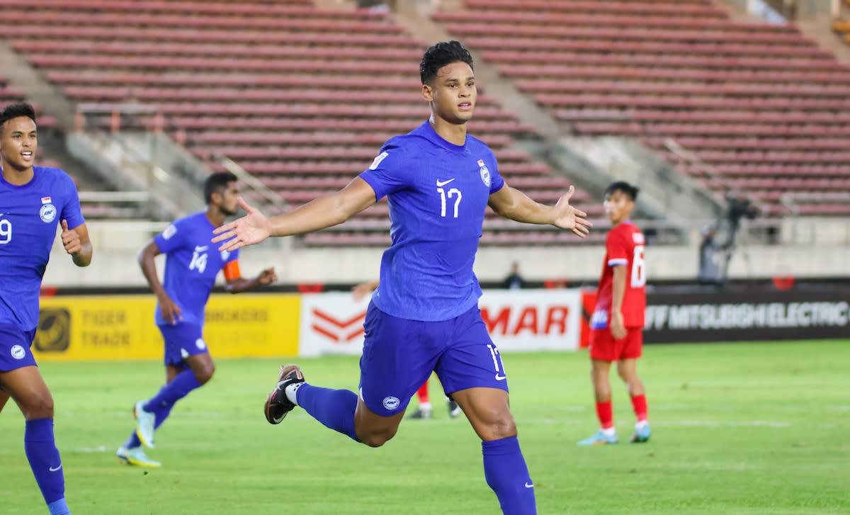 Singapore defender Irfan Fandi celebrates after scoring the opening goal against Laos in the AFF Mitsubishi Electric Cup. (PHOTO: FAS)