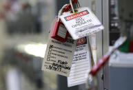 In this March 16, 2017 photo, safety tags and lockout devices secure an out-of-service power switch at the West Point Treatment Plant in Seattle. The plant suffered a massive equipment failure that flooded portions of the plant, crippled operations, and caused millions of gallons of raw sewage and untreated runoff to pour into the United States' second largest estuary. (AP Photo/Ted S. Warren)