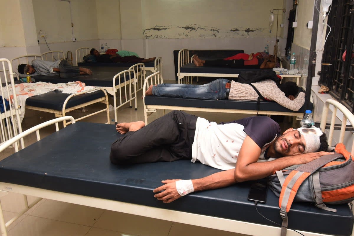 Train accident victims rest at a government hospital some 44km from Buxar (AFP via Getty Images)