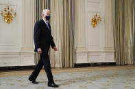 President Joe Biden arrives to speak about efforts to combat COVID-19, in the State Dining Room of the White House, Tuesday, March 2, 2021, in Washington. (AP Photo/Evan Vucci)