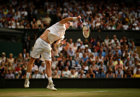 Tennis - Wimbledon - All England Lawn Tennis and Croquet Club, London, Britain - July 13, 2018 South Africa's Kevin Anderson serves during his semi final match against John Isner of the U.S. REUTERS/Tony O'Brien