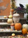 <p>For a sophisticated front porch display, or romantic altar decorations for a fall wedding, arrange uncarved pumpkins of various sizes on steps and in terracotta pots. Cover a select few with glitter blast spray paint.</p><p><a class="link " href="https://www.amazon.com/Krylon-K03804A00-Glitter-Blast-Diamond/dp/B005574IT2?tag=syn-yahoo-20&ascsubtag=%5Bartid%7C10070.g.331%5Bsrc%7Cyahoo-us" rel="nofollow noopener" target="_blank" data-ylk="slk:SHOP SPRAY PAINT;elm:context_link;itc:0;sec:content-canvas">SHOP SPRAY PAINT</a></p>