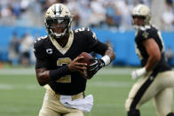 New Orleans Saints quarterback Jameis Winston runs for a touchdown against the Carolina Panthers during the second half of an NFL football game Sunday, Sept. 19, 2021, in Charlotte, N.C. (AP Photo/Nell Redmond)