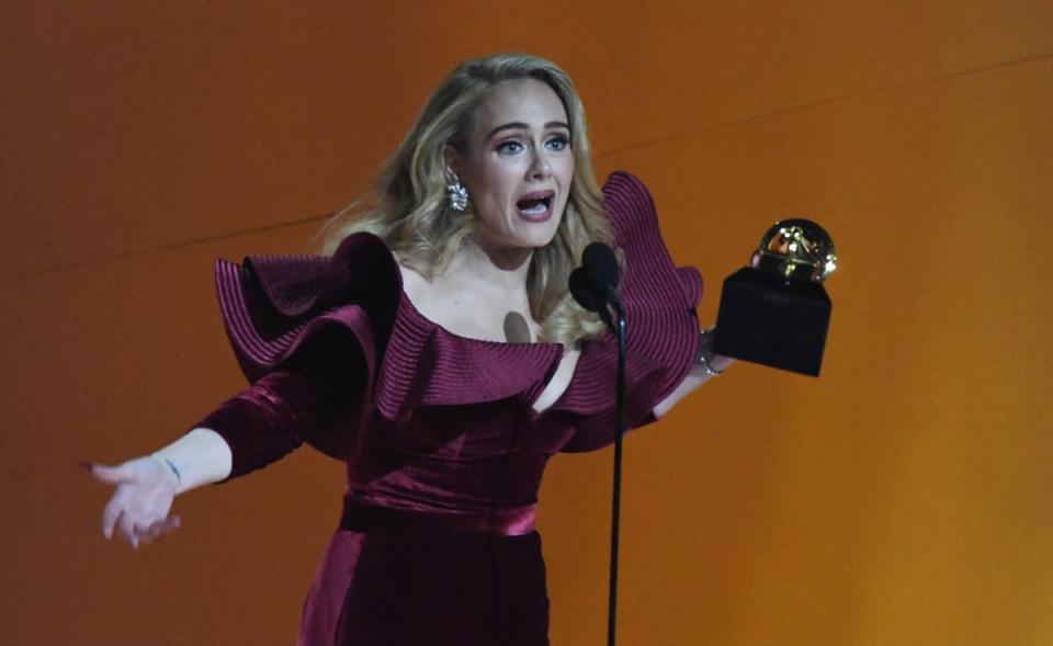 English singer-songwriter Adele accepts the award for Best Pop Solo Performance for for “Easy on Me” (AFP via Getty Images)