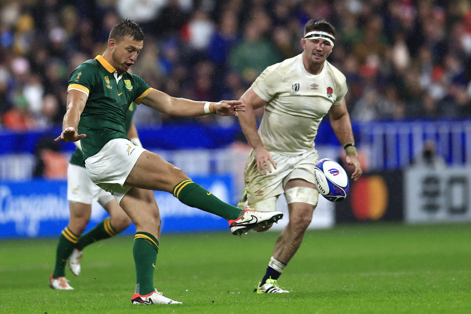 South Africa's Handre Pollard kicks the ball during the Rugby World Cup semifinal match between England and South Africa at the Stade de France in Saint-Denis, near Paris, Saturday, Oct. 21, 2023. (AP Photo/Aurelien Morissard)