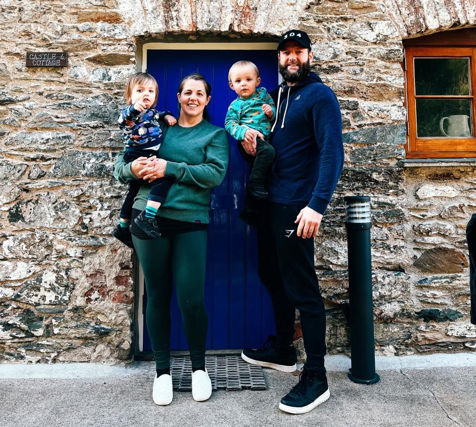 Kate Leahy, nearly two-year-old twin boys, Ted and George, and partner Jonjo at 4 Castle Cottage in Tuckenhay