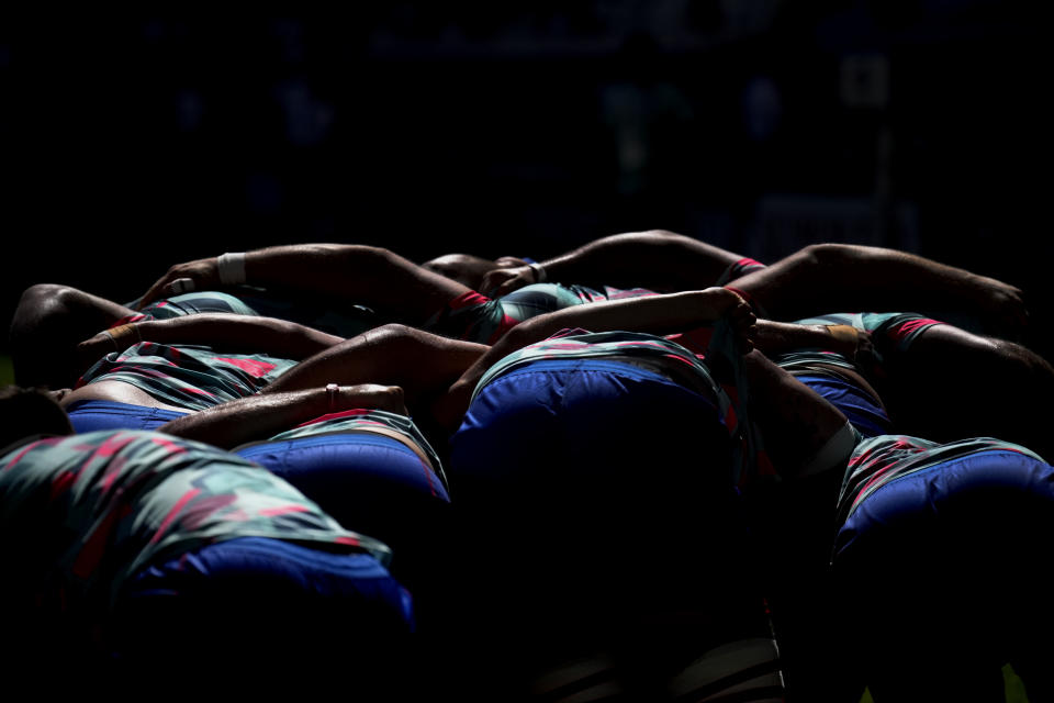 Chile's players take part in a scrum during a warm up prior to the Rugby World Cup Pool D match between Samoa and Chile at the Stade de Bordeaux in Bordeaux, France, Saturday, Sept. 16, 2023. (AP Photo/Christophe Ena)