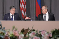 US Secretary of State Antony Blinken, left, and Russian Foreign Minister Sergey Lavrov meet on the sidelines of an Organization for Security and Co-operation in Europe (OSCE) meeting, in Stockholm, Sweden, Thursday, Dec. 2, 2021. (Jonathan Nackstrand/Pool Photo via AP)