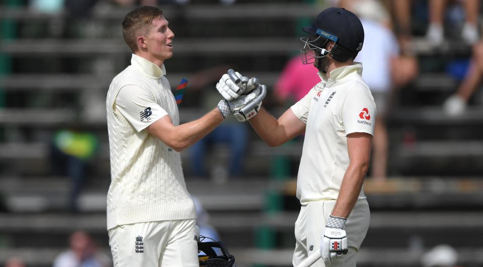 Improving: Zac Crawley and Dom Sibley celebrate their 100 partnership at The Wanderers (Getty Images)