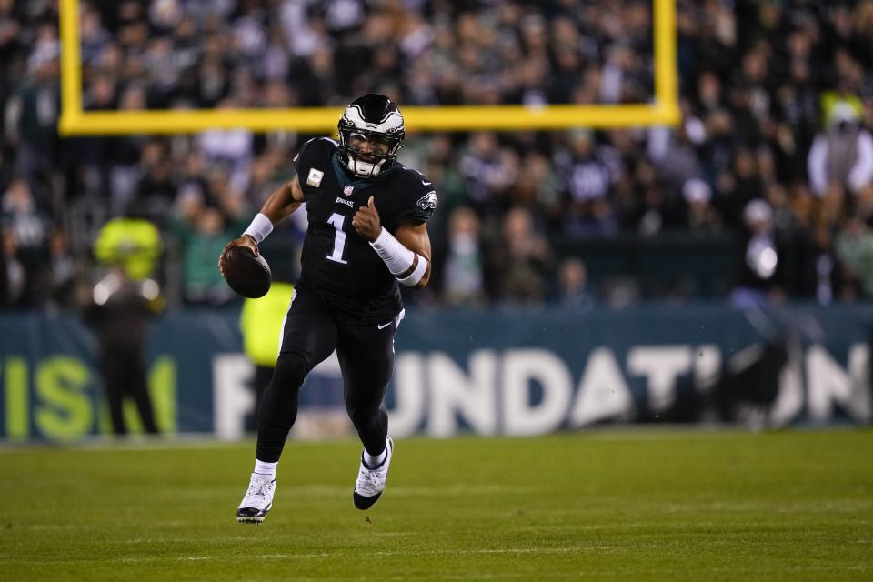 Philadelphia Eagles quarterback Jalen Hurts runs during the first half of an NFL football game against the Green Bay Packers, Sunday, Nov. 27, 2022, in Philadelphia. (AP Photo/Matt Slocum)