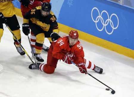 Ice Hockey - Pyeongchang 2018 Winter Olympics - Men Final Match - Olympic Athletes from Russia v Germany - Gangneung Hockey Centre, Gangneung, South Korea - February 25, 2018 - Yannic Seidenberg of Germany and Olympic Athlete from Russia Alexander Barabanov in action. REUTERS/David W Cerny