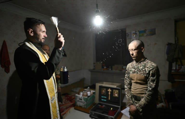 War, death and life are so close, says military chaplain Rostyslav Osuchan (Genya SAVILOV)