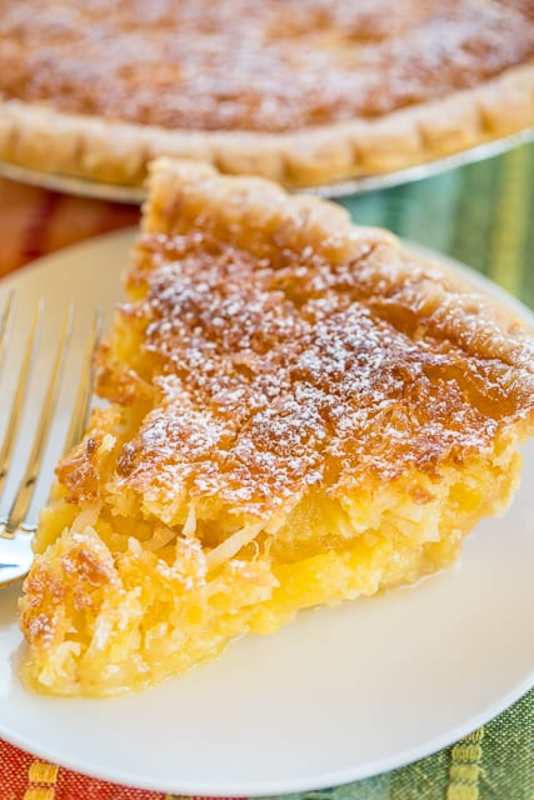 <p>Plain Chicken</p><p>This pineapple coconut chess pie can be served warm or cold.</p><p><strong>Get the recipe: <a href="https://www.plainchicken.com/pineapple-pie/" rel="nofollow noopener" target="_blank" data-ylk="slk:Pineapple Pie;elm:context_link;itc:0;sec:content-canvas" class="link ">Pineapple Pie</a></strong></p>