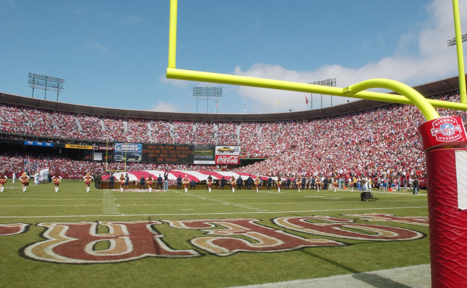 This file photo taken Sept. 12, 2004, shows a view of Candlestick Park before an NFL football game between the Atlanta Falcons and the San Francisco 49ers in San Francisco. The economy may be wobbling along, struggling to break free of the worst downturn since the Great Depression, but the stadium business is doing just fine, thank you. In April 2012, the 49ers broke ground on a new palace for the team. The good folks in Los Angeles are just clamoring to plop down $800 million or so if the NFL will give them another chance. And now, it seems, the Falcons are all but assured of getting a retractable-roof stadium in the not-so-distant future. (AP Photo/Paul Sakuma, file)