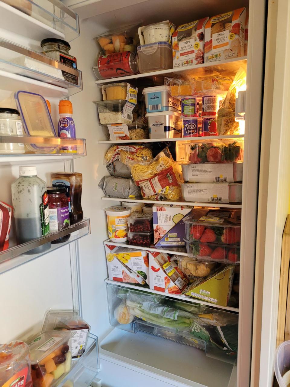 Helen Morrison's fully stocked fridge with free food from OLIO. (PA Real Life)