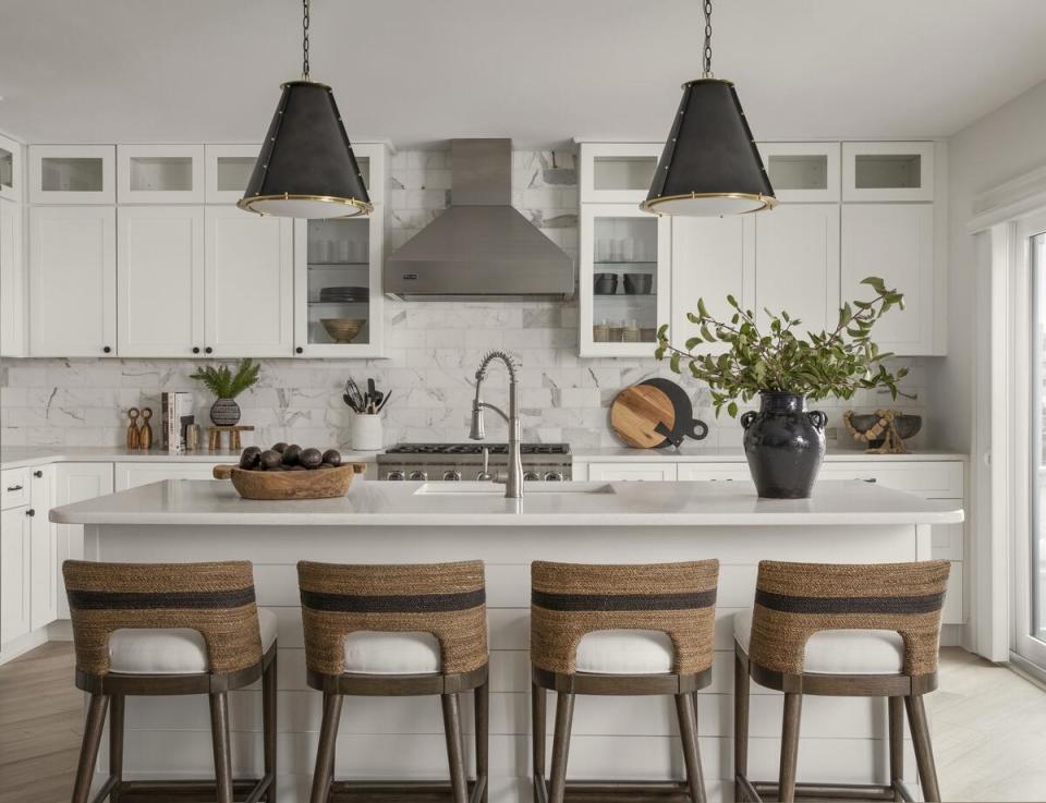 Woven details bring a coastal touch to a clean-lined kitchen