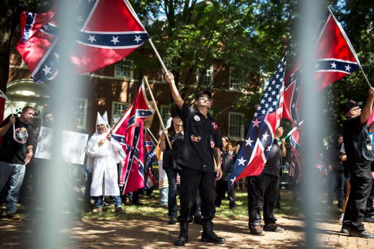 Ku Klux Klan protesters on July 8. The KKK is protesting the planned removal of a statue of General Robert E. Lee, and calling for the protection of Southern Confederate monuments. (Getty)