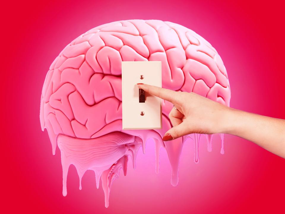 hand hovering over light switch with a melting brain in the background