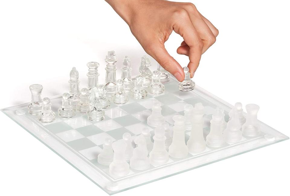 With frosted and clear glass pieces, this chess set definitely looks chic. The pieces each have a felted bottom so that they can easily move around. They'll want this around for all the games to come. <a href="https://amzn.to/2L6wWZ1" target="_blank" rel="noopener noreferrer">Find it for $23 at Amazon</a>. 