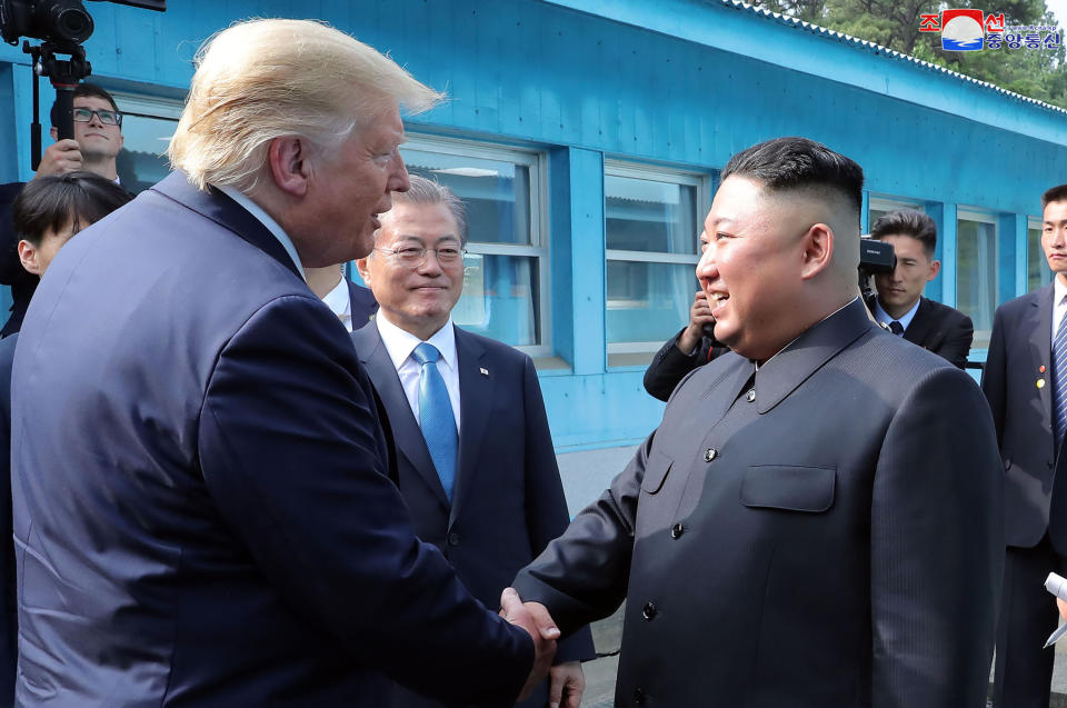 In this Sunday, June 30, 2019, photo provided by the North Korean government, North Korean leader Kim Jong Un, right, bids farewell to U.S. President Donald Trump, left, and South Korean President Moon Jae-in, at the border village of Panmunjom in Demilitarized Zone. The content of this image is as provided and cannot be independently verified. Korean language watermark on image as provided by source reads: "KCNA" which is the abbreviation for Korean Central News Agency. (Korean Central News Agency/Korea News Service via AP)