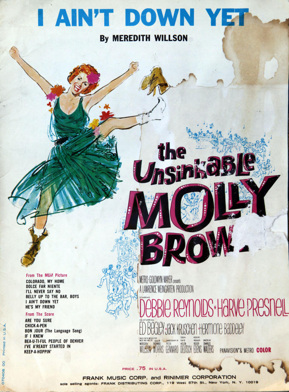 This March 19, 2012 photo shows movie poster from the movie "The Uninikable Molly Brown" on display in the Molly Brown House Museum in Denver. A few blocks from Colorado's state Capitol _ over 1700 miles from the Atlantic Ocean and a mile above sea level _ is a museum dedicated to a woman eclipsed by legend following the sinking of the Titantic. The "unsinkable Molly Brown" moved into this stone Victorian home after she and her husband struck it rich at a gold mine in Colorado's mountains, nearly 20 years before she boarded the Titanic because it was the first boat she could get back home to visit her ailing grandson. (AP Photo/Ed Andrieski)