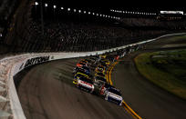 DAYTONA BEACH, FL - FEBRUARY 27: Carl Edwards, driver of the #99 Fastenal Ford, and Greg Biffle, driver of the #16 3M Ford, lead the field on the start of the NASCAR Sprint Cup Series Daytona 500 at Daytona International Speedway on February 27, 2012 in Daytona Beach, Florida. (Photo by Jonathan Ferrey/Getty Images for NASCAR)