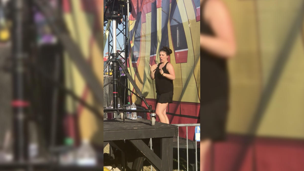 Holly Maniatty interprets Snoop Dogg for the hearing impaired at the New Orleans Jazz Festival. Video still from Facebook
