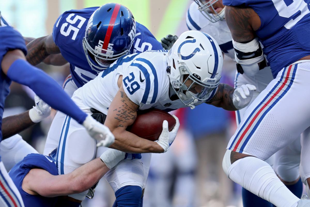 Indianapolis Colts running back Jordan Wilkins (20) runs the ball against  the Tennessee Titans …