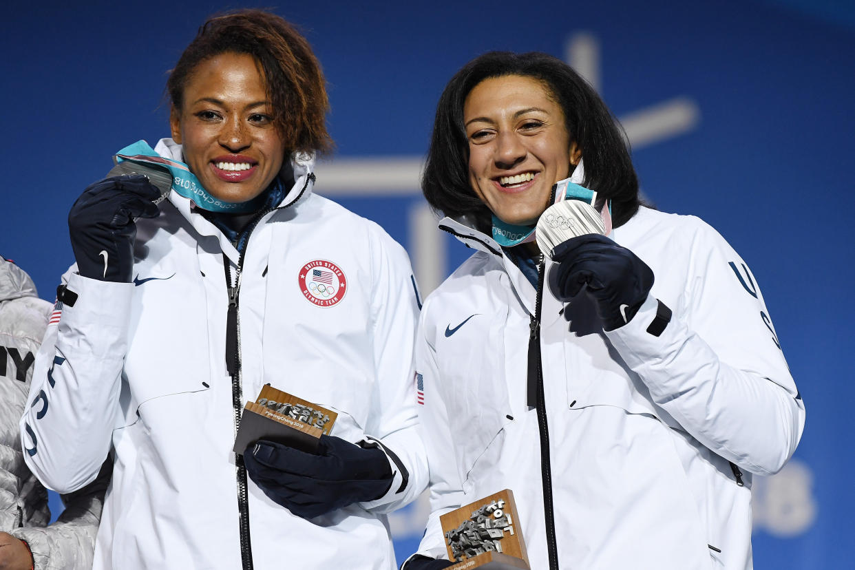 Silver medalists Lauren Gibbs and Elana Meyers Taylor of&nbsp;Team USA celebrate during the medal ceremony for Bobsleigh. (Photo: David Ramos via Getty Images)