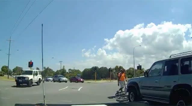 The rider was lucky to walk away from the crash without serious injury. Source: Dash Cam Owners Australia Facebook