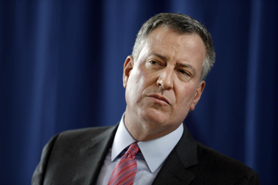 FILE- In this Feb. 25, 2014 file photo, New York City Mayor Bill de Blasio listens to a question during a news conference at P.S. 130 in New York. With state lawmakers working toward a plan to fund pre-kindergarten in New York City, de Blasio can attack other items on his agenda. De Blasio will set his sights on massively expanding affordable housing, hiking wages for the working class and overhauling the city's recovery from Superstorm Sandy. (AP Photo/Seth Wenig, File)