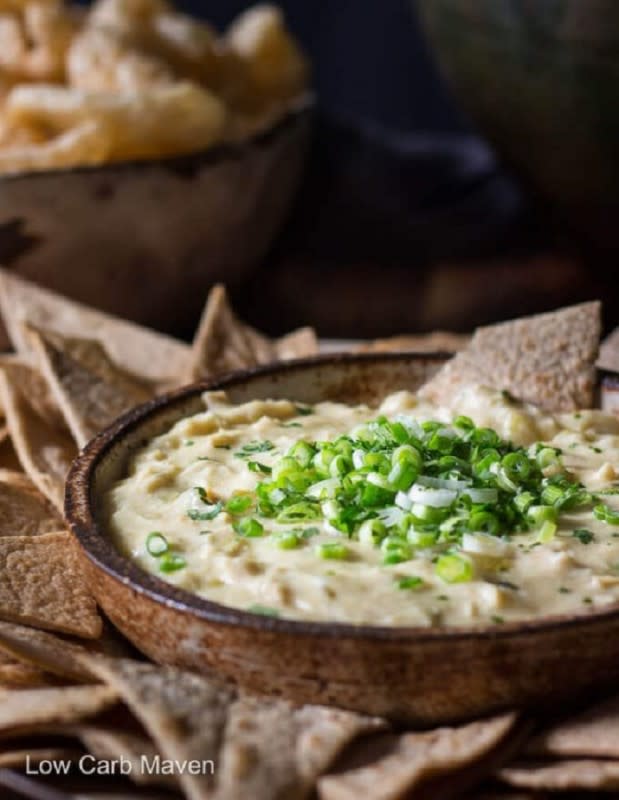 <p>Low Carb Maven</p><p>A fun chicken enchilada dip made with green chiles, chicken and cheese.</p><p><strong>Get the recipe: </strong><a href="https://www.lowcarbmaven.com/low-carb-chicken-enchilada-dip/" rel="nofollow noopener" target="_blank" data-ylk="slk:Low-Carb Chicken Enchilada Dip;elm:context_link;itc:0;sec:content-canvas" class="link rapid-noclick-resp"><strong>Low-Carb Chicken Enchilada Dip</strong></a></p>