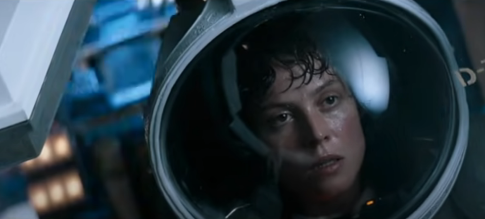 Sigourney Weaver wearing a space suit