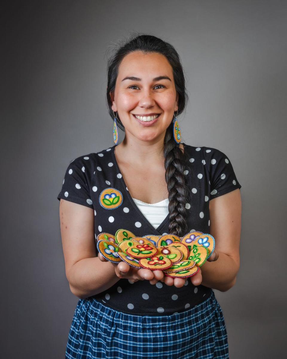 Paula Menaricj learned how to make baby bonnets, beaded earrings, pipe bags, moosehide pins and many other items from her mother and elders in her community. 