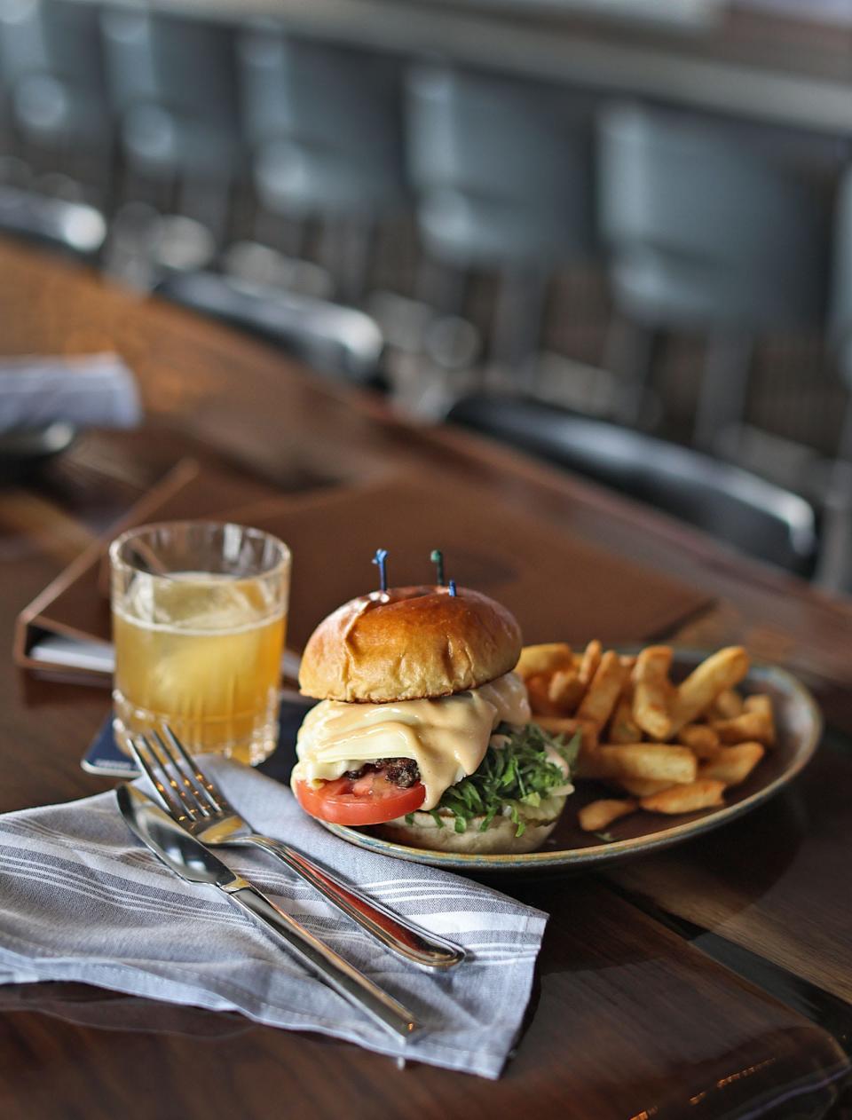 The house burger made with Wagyu beef, house sauce and fries from The Tree on Washington Street in Braintree, shown on Monday, April 1, 2024.