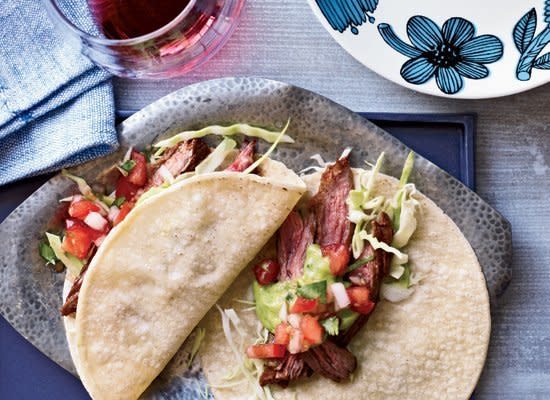 <strong>Get the <a href="http://www.huffingtonpost.com/2011/10/27/chile-spiced-skirt-steak-_n_1058306.html" target="_hplink">Chile-Spiced Skirt Steak Tacos</a> recipe by Con Poulos from Food & Wine</strong>