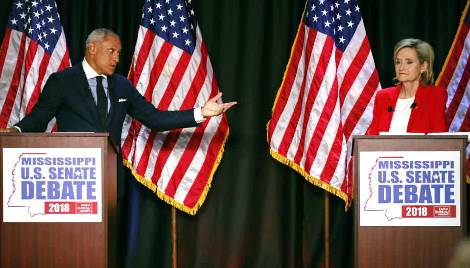 Democrat Mike Espy challenges appointed U.S. Sen. Cindy Hyde-Smith, R-Miss., during their televised debate in Jackson, Miss., on Nov. 20. (Photo: Rogelio V. Solis, Pool/AP)