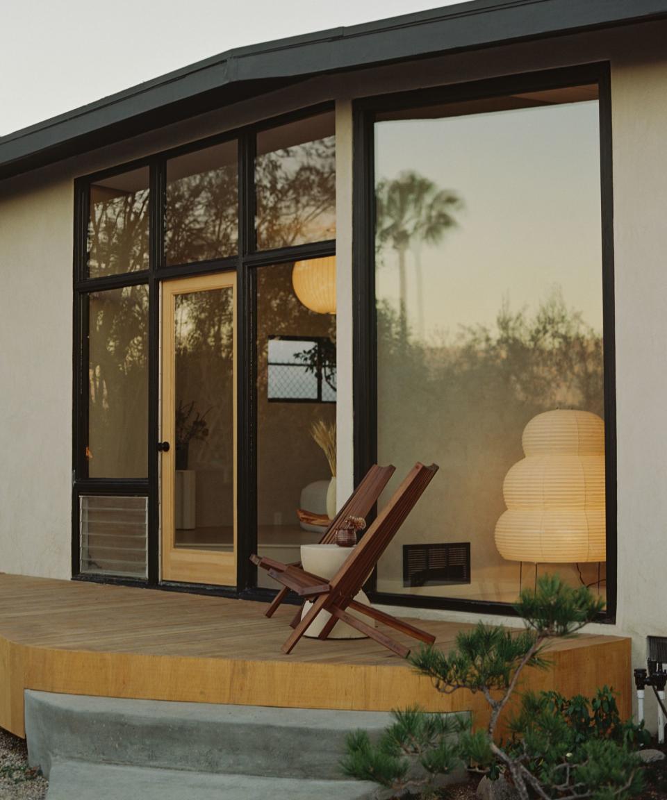 Wooden patio, chairs, grey steps