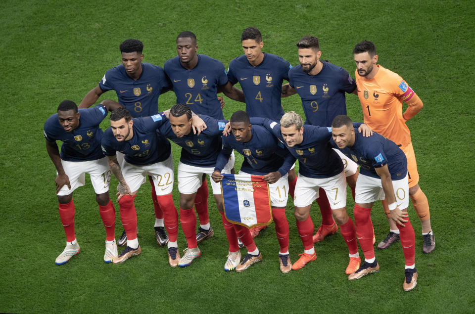 AL KHOR, QATAR - DECEMBER 14: The France team line up, back row l-r, Aurelien Tchouameni, Ibrahima Konate, Raphael Varane, Olivier Giroud, Hugo Lloris, front row l-r, Youssouf Fofana, Theo Hernandez, Jules Kounde, Ousmane Dembele, Antoine Griezmann, Kylian Mbappe before the FIFA World Cup Qatar 2022 semi final match between France and Morocco at Al Bayt Stadium on December 14, 2022 in Al Khor, Qatar. (Photo by Visionhaus/Getty Images)